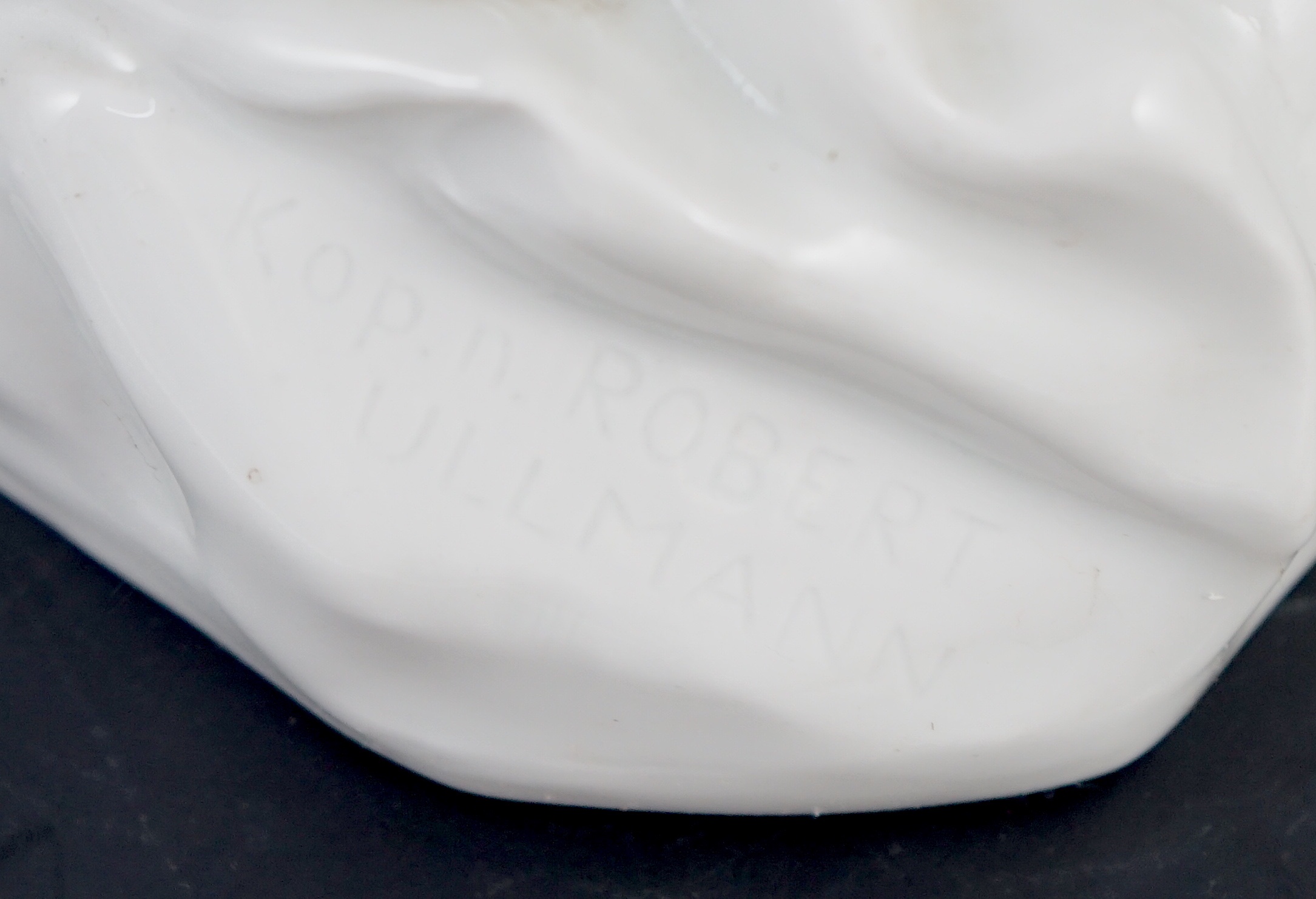 Robert Ullmann (1903-1966) for Meissen, a large white glazed porcelain three-quarter length figure of a nude woman, 50.5cm high